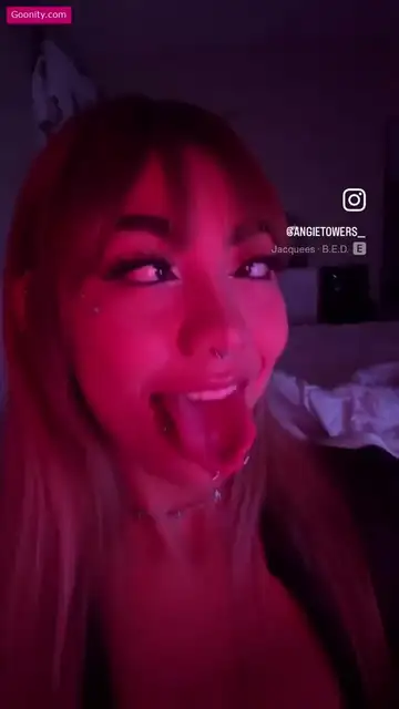 Towerss Sticking Her Tongue Out In Red Light Nude OnlyFans Video